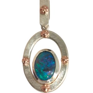 Lightning Ridge Green on black Opal pendant The shimmering pure silver halo setting has rose gold rosette highlights.